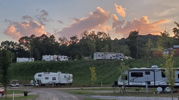 RV Sites - Our campground offers a variety of full hook-up sites (water, electric, and sewer), including creek- and lakefront sites. We can accommodate 30-amp and 50-amp needs. We have several pull-thru sites, back-in sites, and are big rig friendly. RV Sites - Our campground offers a variety of full hook-up sites (water, electric, and sewer), including creek- and lakefront sites. We can accommodate 30-amp and 50-amp needs. We have several pull-thru sites, back-in sites, and are big rig friendly.