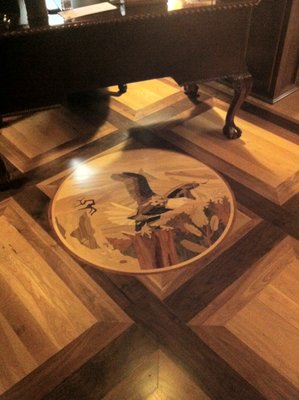 Custom Medallion Inlay - This home office project shows a customized medallion inlay with an intricate floor pattern to match their coffered ceiling.