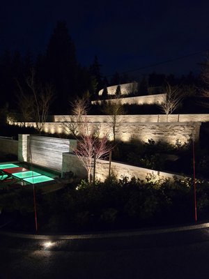 Lighting Projects - Lighting is the final touch in any landscape project. To us, it is like artwork. We strive to avoid the runway look, and instead create evening spaces that highlight the beauty of your garden, trees, and your property as a whole. When done correctly, lighting can create an evening scape that guides visitors (and you!) through your garden in all it's glory. We LOVE outdoor lighting for what it adds to your project! Lighting Projects - Lighting is the final touch in any landscape project. To us, it is like artwork. We strive to avoid the runway look, and instead create evening spaces that highlight the beauty of your garden, trees, and your property as a whole. When done correctly, lighting can create an evening scape that guides visitors (and you!) through your garden in all it's glory. We LOVE outdoor lighting for what it adds to your project!