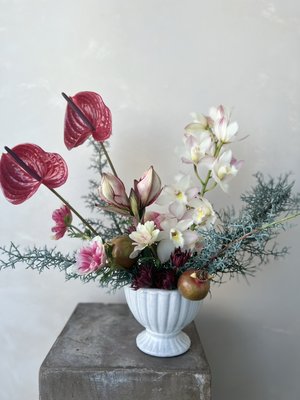 Holiday flower arrangements - We offer holiday flower arrangements for celebrating with you loved ones. We also offer floral design services for corporate holiday parties and personal holiday events.