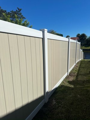 Two-tone Vinyl Privacy Fence - Upgrade your home with a stylish and durable two-tone vinyl privacy fence, as seen in our recent installation. This modern fencing solution features attractive beige panels with crisp white posts and rails, delivering both exceptional curb appeal and long-lasting performance.
Our vinyl privacy fences are ideal for homeowners seeking low-maintenance, weather-resistant, and fade-proof options that provide maximum privacy and security for their property. Two-tone Vinyl Privacy Fence - Upgrade your home with a stylish and durable two-tone vinyl privacy fence, as seen in our recent installation. This modern fencing solution features attractive beige panels with crisp white posts and rails, delivering both exceptional curb appeal and long-lasting performance.
Our vinyl privacy fences are ideal for homeowners seeking low-maintenance, weather-resistant, and fade-proof options that provide maximum privacy and security for their property.
