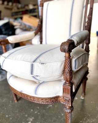 Antique Chair Revival - This beautifully carved chair received a full restoration with careful attention to both structure and detail.
Structural Support: The webbing and support straps were adjusted to ensure lasting durability and comfort.
Cushion Care: The down pillow casing was reaffirmed, keeping the seat plush and supportive for years to come.
Fabric Matching: The striped fabric was carefully measured and aligned so the lines flow seamlessly across the back, seat, and arms.
Double Piping Finish: Every edge was refined with double piping, adding both strength and a sophisticated touch.
The result is a chair that feels solid, looks timeless, and showcases both its carved wood details and elegant new upholstery. A perfect balance of classic beauty and renewed comfort. Antique Chair Revival - This beautifully carved chair received a full restoration with careful attention to both structure and detail.
Structural Support: The webbing and support straps were adjusted to ensure lasting durability and comfort.
Cushion Care: The down pillow casing was reaffirmed, keeping the seat plush and supportive for years to come.
Fabric Matching: The striped fabric was carefully measured and aligned so the lines flow seamlessly across the back, seat, and arms.
Double Piping Finish: Every edge was refined with double piping, adding both strength and a sophisticated touch.
The result is a chair that feels solid, looks timeless, and showcases both its carved wood details and elegant new upholstery. A perfect balance of classic beauty and renewed comfort.