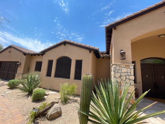 Exterior Wood Trim Staining & Restoration – Scottsdale - Aged and weathered wood trim on this Scottsdale home required a full refresh. We power-washed and scuff-sanded all trim and fascia, then applied a premium, UV-resistant stain that both restores natural beauty and protects against Arizona’s harsh sun. The result: a richer, more vibrant finish that elevates the home’s curb appeal and longevity.