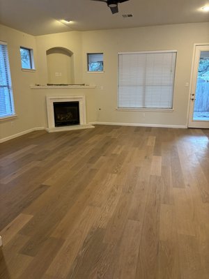 Hardwood floors in Twin Creeks - This was 1100 ft.² of hardwood installed with 1100 ft.² of 12 x 12 tile removal