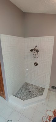 Tile Shower Rebuild - This client called because their shower was leaking in the basement below. Originally we were going to grout and seal the shower, but we fou