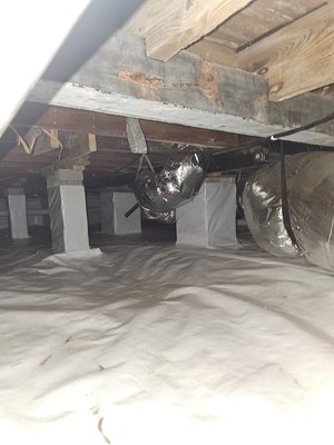 Crawlspace Encapsultion and Insulation - Complete removal of crawlspace debris and installed foam board insulation along the foundation wall with a seamless encapsulation of the walls and piers.