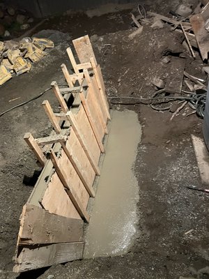 Concrete Stairs - Concrete staircase poured in a backyard, replacing a previously rotted out wooden staircase Concrete Stairs - Concrete staircase poured in a backyard, replacing a previously rotted out wooden staircase