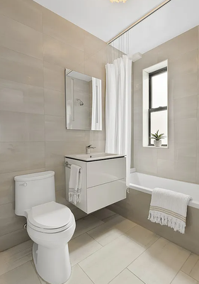 Park Slope Apartment Remodel - 90 8th Avenue - This renovation involved a comprehensive update throughout the apartment. We replaced all doors, trims, base moldings, and closets, while fully renovating the bathrooms with new finishes. The existing tile flooring was removed and replaced with wooden floors throughout. The project also included relocating the radiator in the bedroom and installing a new radiator in the den. A new laundry room was created, along with the installation of drop ceilings for a modern look. Closets were adjusted for optimized storage, and base moldings and trims were added throughout. We applied skim coat, plastered, and painted the walls, and the wooden floors were sanded and stained for a polished finish. The overall result was a refreshed, cohesive, and modernized apartment. Park Slope Apartment Remodel - 90 8th Avenue - This renovation involved a comprehensive update throughout the apartment. We replaced all doors, trims, base moldings, and closets, while fully renovating the bathrooms with new finishes. The existing tile flooring was removed and replaced with wooden floors throughout. The project also included relocating the radiator in the bedroom and installing a new radiator in the den. A new laundry room was created, along with the installation of drop ceilings for a modern look. Closets were adjusted for optimized storage, and base moldings and trims were added throughout. We applied skim coat, plastered, and painted the walls, and the wooden floors were sanded and stained for a polished finish. The overall result was a refreshed, cohesive, and modernized apartment.