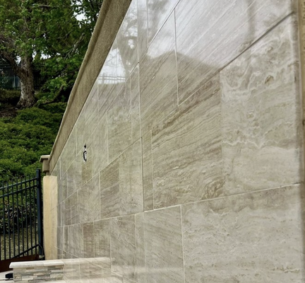 Marble Patio Wall Restoration - Protecting your natural stone from sun and water exposure:
1. Protection from Weather Elements
Water Resistance: Marble is porous, meaning it can absorb water. Unsealed marble walls can absorb rainwater, leading to potential damage such as staining, cracking, or even structural weakness due to freeze-thaw cycles in colder climates.
UV Protection: Prolonged exposure to sunlight can cause marble to fade or discolor over time. A sealant can protect against UV rays, helping the marble maintain its original color and finish.
2. Preventing Stains and Dirt Accumulation
Stain Resistance: Outdoor environments expose marble to various contaminants, including dirt, pollution, bird droppings, and organic matter like leaves. Sealing creates a protective barrier that makes it harder for these substances to penetrate the marble and cause stains.
Easier Cleaning: Sealed marble is easier to clean since the sealant prevents dirt and grime from embedding deeply into the stone's surface.
3. Reducing Damage from Acidic Substances
Acid Rain and Pollutants: Marble is sensitive to acidic substances, which can cause etching or surface damage. Sealants provide a protective layer that reduces the risk of damage from acid rain or other acidic pollutants present in the atmosphere.
4. Longevity and Durability
Enhanced Durability: Sealing helps preserve the structural integrity of the marble by preventing moisture penetration and reducing the risk of cracks or erosion. This can extend the life of the marble and reduce the need for costly repairs or replacements.
Preservation of Aesthetics: Regular sealing helps maintain the marble's appearance, keeping it looking polished and well-maintained for years.
5. Cost-Effective Maintenance
Lower Maintenance Costs: Sealed marble requires less frequent cleaning and maintenance, saving time and money in the long run. Preventive sealing is far more cost-effective than repairing or replacing damaged marble.
Sealing outside marble walls is essential to protect the stone from the harsh outdoor environment, maintain its beauty, and ensure its longevity. Regular maintenance, including resealing, is key to preserving the marble’s quality over time. Marble Patio Wall Restoration - Protecting your natural stone from sun and water exposure:
1. Protection from Weather Elements
Water Resistance: Marble is porous, meaning it can absorb water. Unsealed marble walls can absorb rainwater, leading to potential damage such as staining, cracking, or even structural weakness due to freeze-thaw cycles in colder climates.
UV Protection: Prolonged exposure to sunlight can cause marble to fade or discolor over time. A sealant can protect against UV rays, helping the marble maintain its original color and finish.
2. Preventing Stains and Dirt Accumulation
Stain Resistance: Outdoor environments expose marble to various contaminants, including dirt, pollution, bird droppings, and organic matter like leaves. Sealing creates a protective barrier that makes it harder for these substances to penetrate the marble and cause stains.
Easier Cleaning: Sealed marble is easier to clean since the sealant prevents dirt and grime from embedding deeply into the stone's surface.
3. Reducing Damage from Acidic Substances
Acid Rain and Pollutants: Marble is sensitive to acidic substances, which can cause etching or surface damage. Sealants provide a protective layer that reduces the risk of damage from acid rain or other acidic pollutants present in the atmosphere.
4. Longevity and Durability
Enhanced Durability: Sealing helps preserve the structural integrity of the marble by preventing moisture penetration and reducing the risk of cracks or erosion. This can extend the life of the marble and reduce the need for costly repairs or replacements.
Preservation of Aesthetics: Regular sealing helps maintain the marble's appearance, keeping it looking polished and well-maintained for years.
5. Cost-Effective Maintenance
Lower Maintenance Costs: Sealed marble requires less frequent cleaning and maintenance, saving time and money in the long run. Preventive sealing is far more cost-effective than repairing or replacing damaged marble.
Sealing outside marble walls is essential to protect the stone from the harsh outdoor environment, maintain its beauty, and ensure its longevity. Regular maintenance, including resealing, is key to preserving the marble’s quality over time.
