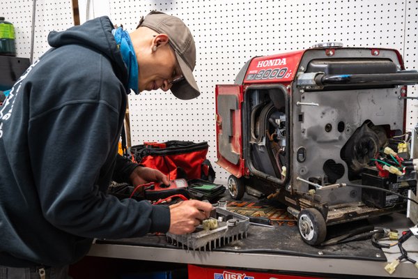 Honda EU3000iS inverter generator repair - A customer brought in their Honda EU3000iS inverter generator because it had stopped working and they didn't want to replace it. We got to work, found the problem, fixed it, buttoned it back up and it's as good as new. We can repair any small engine you can bring us!