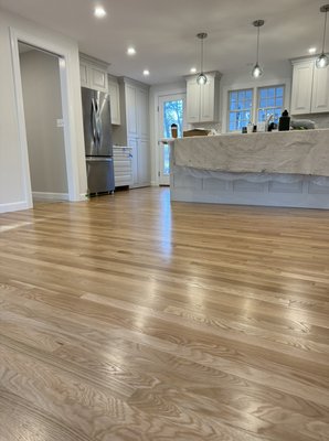 Kitchen remodel - It was a brand new construction in Sudbury Ma. We installed 2 1/4 white oak and finished with 3coats of polyurethane.