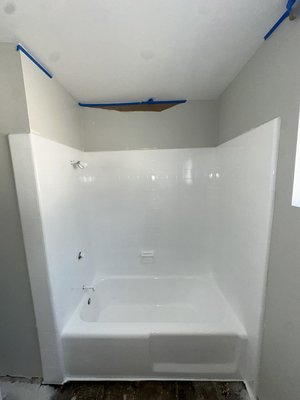 Cast-iron bathtub ceramic tile strip tub remove shower tracks, repair, grout holes Reglaze - Cast-iron bathtub ceramic tile