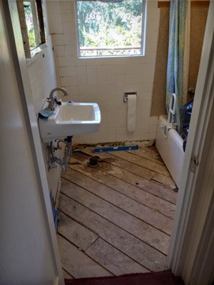 Bathroom Floor Replacement - Old house with a failing subfloor and toilet flange in bathroom that needed some TLC.