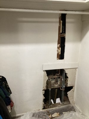 Drywall Repair in Closet - The tenant had a plumbing leak and the plumber left a cut out after he was finished repairing the leak as is common. E4 Handyman Services stepped in to finish up the patching and painting of the drywall. Drywall Repair in Closet - The tenant had a plumbing leak and the plumber left a cut out after he was finished repairing the leak as is common. E4 Handyman Services stepped in to finish up the patching and painting of the drywall.