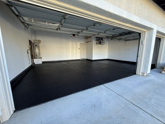 Epoxy Flooring - For this 3-car garage project, we installed a Carbon Black full-flake epoxy flooring system to create a clean, modern, and highly durable finish. We started by diamond-grinding the concrete to properly prepare the surface, then repaired any cracks or imperfections to ensure a smooth and lasting bond.
A moisture-resistant epoxy base coat was applied, followed by a full broadcast of Carbon Black decorative flakes across the entire floor including stem walls for a seamless look. Once cured, the floor was scraped and vacuumed to remove excess flake before sealing everything with a UV-stable, chemical-resistant polyaspartic topcoat.
The finished floor is slip-resistant, easy to clean, and resistant to hot-tire pickup, stains, and everyday wear, giving the garage a sleek showroom-style appearance while adding real usability and value to the home.
This type of system is ideal for homeowners who want a garage floor that’s both beautiful and built to last. Epoxy Flooring - For this 3-car garage project, we installed a Carbon Black full-flake epoxy flooring system to create a clean, modern, and highly durable finish. We started by diamond-grinding the concrete to properly prepare the surface, then repaired any cracks or imperfections to ensure a smooth and lasting bond.
A moisture-resistant epoxy base coat was applied, followed by a full broadcast of Carbon Black decorative flakes across the entire floor including stem walls for a seamless look. Once cured, the floor was scraped and vacuumed to remove excess flake before sealing everything with a UV-stable, chemical-resistant polyaspartic topcoat.
The finished floor is slip-resistant, easy to clean, and resistant to hot-tire pickup, stains, and everyday wear, giving the garage a sleek showroom-style appearance while adding real usability and value to the home.
This type of system is ideal for homeowners who want a garage floor that’s both beautiful and built to last.