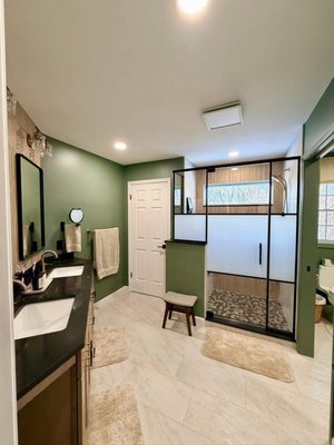 Master Bath Remodel-Castleton - This builder's grade master received a much need upgrade. New tiled floors, custom built tiled shower with custom glass enclosure. Custom vanity cabinetry with Cambria Quartz countertop. Added washer/dryer hook ups inside the water closet. Master Bath Remodel-Castleton - This builder's grade master received a much need upgrade. New tiled floors, custom built tiled shower with custom glass enclosure. Custom vanity cabinetry with Cambria Quartz countertop. Added washer/dryer hook ups inside the water closet.