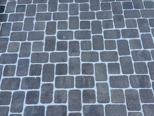 Drive way pavers: paver sand - Complete paver restoration in Brunswick, GA. We deep cleaned and resanded this driveway using professional surface cleaning and polymeric sand to restore color, strengthen joints, and prevent weeds. The result: crisp lines, lasting durability, and a refreshed, high-end finish that boosts curb appeal.