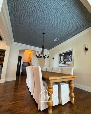 Wallpaper Done Right - Check out this dining room with a beautifully textured wallpaper ceiling, a subtle yet striking design upgrade that elevates the whole space. Our team brought precision and care to every detail for a flawless finish. Wallpaper Done Right - Check out this dining room with a beautifully textured wallpaper ceiling, a subtle yet striking design upgrade that elevates the whole space. Our team brought precision and care to every detail for a flawless finish.