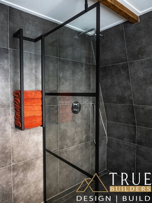 Saratoga Bathroom Renovation - This project was really fun to work with because our client challenged our previous experiences of having clients who wanted brown and tan neutral tones for bathrooms, so working with charcoal tile and seeking other accessories to add to this bathroom to keep it unique for our client and our portfolio. Saratoga Bathroom Renovation - This project was really fun to work with because our client challenged our previous experiences of having clients who wanted brown and tan neutral tones for bathrooms, so working with charcoal tile and seeking other accessories to add to this bathroom to keep it unique for our client and our portfolio.