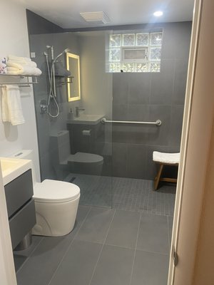 Bathroom Remodel - This remodel was done in the basement of this home. The previous bathroom was done by the previous owner. Once demo was completed it was determined all new plumbing and electrical was needed to complete the job correctly. That in tailed removal of the concrete floor and new electric ran. Fortunately our team was able to take care of all it and keep the cost down for the homeowner. After that we were able to work our magic. Turns this dated bathroom in to a modern dream shower. Call us today to get booked this year! Bathroom Remodel - This remodel was done in the basement of this home. The previous bathroom was done by the previous owner. Once demo was completed it was determined all new plumbing and electrical was needed to complete the job correctly. That in tailed removal of the concrete floor and new electric ran. Fortunately our team was able to take care of all it and keep the cost down for the homeowner. After that we were able to work our magic. Turns this dated bathroom in to a modern dream shower. Call us today to get booked this year!