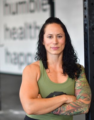 Our Staff - Allison Jachowski — Owner | Head Coach
Certs: CFL3, CF-Gymnastics, CF-Weightlifting, OPEX L1 Coach, USAW, CF-Kettlebell
A former competitive gymnast, Allison got hooked on CrossFit visiting friends who owned a gym in California. She started coaching in 2013, moving from Head Coach to owner alongside husband Jason in 2016 — eased by prior small-business experience. She strives daily to share her passion and inspire others toward an active life. Outside the gym she's with Jason and son Simon, and the family loves to travel.
Jason Jachowski — Owner | Coach
Certs: CFL3 Trainer
Jason grew up loving team sports but lost his drive once his playing days ended. High school lacrosse coaching and a standard gym routine didn't fill the gap. The same California trip that hooked Allison left him "humbled and hooked immediately." Back in Frederick he fell for the process and the community pushing him to be his best; owning ODIN with Allison is, in his words, a dream come true.
Courtney Fike — Program Director & Coach
Certs: CFL2 Trainer
A former gymnast and cheerleader, Courtney competed on the Acrobatics & Tumbling team at the University of Maryland. After graduating she missed the team dynamic and drifted out of shape. She found CrossFit in 2020 and fell for the community and the challenge — it's helped her mental health as much as physical, and as someone who manages anxiety daily, ODIN is where the overthinking floats away. Outside the gym she works in Special Education.
Molly Divens — Member Onboarding Specialist & Coach
Certs: CFL2 Trainer
Molly played soccer and lacrosse through college and found it hard to stay motivated once organized sports ended. Working out alongside teammates is what pushes her; she's fitter now than a decade ago in college sports. The friendships she's gained at ODIN are her favorite part, including watching her own husband get hooked on the ODIN Mindset. Fun fact: she once lived and worked aboard tug boats.
Carlos Neris — Marketing & Communications Manager & Coach
Certs: CFL2 Trainer
Born and raised in Puerto Rico, Carlos moved to Maryland after his undergrad degree. Never a fan of "globo gyms," CrossFit felt intimidating when he started in 2015 in college. After graduating from his gym's Roots program, he was hooked on the methodology and community, earning his Level 1 in 2019 to pursue coaching. He's passionate about helping members build good form. Outside the gym: home, travel, and the outdoors.
Devin Johnson — Community Manager & Coach
Certs: CFL2 Trainer
Devin has been in sports his whole life — basketball, baseball, and football (a proud Washington Commanders fan). He was introduced to CrossFit in 2012 through a garage gym in Clarksburg, MD, while looking to stay competitive after college football, and never looked back. He loves the atmosphere, community, and competitive spirit. Outside the gym: a self-described food lover who enjoys traveling and time with his wife and son.
JP Olguin — Coach
Certs: CFL2 Trainer
Born and raised in Miami with Peruvian roots, JP has always loved running and exercise. CrossFit's varied conditioning work constantly challenges him, and the ODIN community made him want to take on coaching. He moved to Frederick in 2021 for biomedical engineering and works as an FDA scientist reviewing medical devices.
Kevin Patton — Coach
Certs: CFL2 Trainer
Kevin grew up in Frederick playing team sports and lacrosse at the collegiate level. After his "glory days," a big-box gym wasn't cutting it — his brother convinced him to try CrossFit, and he was hooked. Joining ODIN in 2016, he was welcomed into the Tribe and gained lifelong friends; coaching now lets him give back.
Sharri — Coach
Certs: CFL1 Trainer
Part of ODIN's coaching team.
Ryan Webb — Coach
Certs: CFL2 Trainer
A friend finally convinced Ryan, a lifelong team-sports guy, to try CrossFit, and the environment suited him well. He calls it a fitness roller coaster best enjoyed with friends. For him, coaching is about the little things: the smile after a lift clicks, the nod after a cue helps, the genuine "thank you" after a great WOD.
Ann Scarborough — Coach
Certs: CFL2 Trainer
ODIN has been Ann's happy place since 2018. What she didn't expect was a community that's supported her through her darkest moments and celebrated her brightest. Nothing fills her cup more than watching an athlete hit a PR or find courage to try something new. Outside the gym: motorcycle rides and cheering on the lacrosse teams her husband coaches.
Chris Belk — Coach
Certs: CFL1 Trainer
Chris started CrossFit in California in 2013, then stepped away to become a firefighter in Frederick. He returned with even greater appreciation for it, having missed the community — which is what drew him to the ODIN family. Outside the gym he enjoys time with his wife and daughter, being outdoors, and a good cup of coffee. Our Staff - Allison Jachowski — Owner | Head Coach
Certs: CFL3, CF-Gymnastics, CF-Weightlifting, OPEX L1 Coach, USAW, CF-Kettlebell
A former competitive gymnast, Allison got hooked on CrossFit visiting friends who owned a gym in California. She started coaching in 2013, moving from Head Coach to owner alongside husband Jason in 2016 — eased by prior small-business experience. She strives daily to share her passion and inspire others toward an active life. Outside the gym she's with Jason and son Simon, and the family loves to travel.
Jason Jachowski — Owner | Coach
Certs: CFL3 Trainer
Jason grew up loving team sports but lost his drive once his playing days ended. High school lacrosse coaching and a standard gym routine didn't fill the gap. The same California trip that hooked Allison left him "humbled and hooked immediately." Back in Frederick he fell for the process and the community pushing him to be his best; owning ODIN with Allison is, in his words, a dream come true.
Courtney Fike — Program Director & Coach
Certs: CFL2 Trainer
A former gymnast and cheerleader, Courtney competed on the Acrobatics & Tumbling team at the University of Maryland. After graduating she missed the team dynamic and drifted out of shape. She found CrossFit in 2020 and fell for the community and the challenge — it's helped her mental health as much as physical, and as someone who manages anxiety daily, ODIN is where the overthinking floats away. Outside the gym she works in Special Education.
Molly Divens — Member Onboarding Specialist & Coach
Certs: CFL2 Trainer
Molly played soccer and lacrosse through college and found it hard to stay motivated once organized sports ended. Working out alongside teammates is what pushes her; she's fitter now than a decade ago in college sports. The friendships she's gained at ODIN are her favorite part, including watching her own husband get hooked on the ODIN Mindset. Fun fact: she once lived and worked aboard tug boats.
Carlos Neris — Marketing & Communications Manager & Coach
Certs: CFL2 Trainer
Born and raised in Puerto Rico, Carlos moved to Maryland after his undergrad degree. Never a fan of "globo gyms," CrossFit felt intimidating when he started in 2015 in college. After graduating from his gym's Roots program, he was hooked on the methodology and community, earning his Level 1 in 2019 to pursue coaching. He's passionate about helping members build good form. Outside the gym: home, travel, and the outdoors.
Devin Johnson — Community Manager & Coach
Certs: CFL2 Trainer
Devin has been in sports his whole life — basketball, baseball, and football (a proud Washington Commanders fan). He was introduced to CrossFit in 2012 through a garage gym in Clarksburg, MD, while looking to stay competitive after college football, and never looked back. He loves the atmosphere, community, and competitive spirit. Outside the gym: a self-described food lover who enjoys traveling and time with his wife and son.
JP Olguin — Coach
Certs: CFL2 Trainer
Born and raised in Miami with Peruvian roots, JP has always loved running and exercise. CrossFit's varied conditioning work constantly challenges him, and the ODIN community made him want to take on coaching. He moved to Frederick in 2021 for biomedical engineering and works as an FDA scientist reviewing medical devices.
Kevin Patton — Coach
Certs: CFL2 Trainer
Kevin grew up in Frederick playing team sports and lacrosse at the collegiate level. After his "glory days," a big-box gym wasn't cutting it — his brother convinced him to try CrossFit, and he was hooked. Joining ODIN in 2016, he was welcomed into the Tribe and gained lifelong friends; coaching now lets him give back.
Sharri — Coach
Certs: CFL1 Trainer
Part of ODIN's coaching team.
Ryan Webb — Coach
Certs: CFL2 Trainer
A friend finally convinced Ryan, a lifelong team-sports guy, to try CrossFit, and the environment suited him well. He calls it a fitness roller coaster best enjoyed with friends. For him, coaching is about the little things: the smile after a lift clicks, the nod after a cue helps, the genuine "thank you" after a great WOD.
Ann Scarborough — Coach
Certs: CFL2 Trainer
ODIN has been Ann's happy place since 2018. What she didn't expect was a community that's supported her through her darkest moments and celebrated her brightest. Nothing fills her cup more than watching an athlete hit a PR or find courage to try something new. Outside the gym: motorcycle rides and cheering on the lacrosse teams her husband coaches.
Chris Belk — Coach
Certs: CFL1 Trainer
Chris started CrossFit in California in 2013, then stepped away to become a firefighter in Frederick. He returned with even greater appreciation for it, having missed the community — which is what drew him to the ODIN family. Outside the gym he enjoys time with his wife and daughter, being outdoors, and a good cup of coffee.