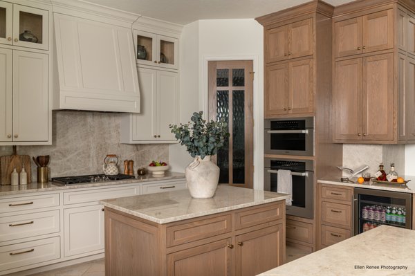 Custom Kitchen & Bath Remodel - This custom remodel was a complete renovation of the kitchen and primary bathroom. We were able to completely transform the homeowner's original rooms and breathe new life into the space for them to enjoy for many years. The remodel included all aspects of our services, from custom cabinets and painting to stone countertops and electrical installations. We worked directly with the homeowner and their interior designer to bring their vision to life.