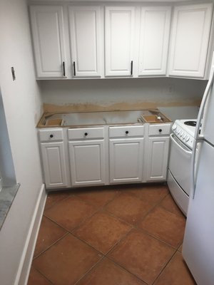 Kitchen cabinets - This was another rental property that needed to have the kitchen updated so we changed the look of the cabinets in the kitchen