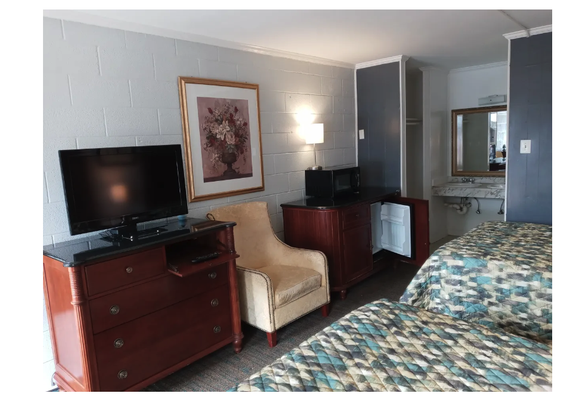 Book Your Next Stay - We offer a variety of amenities to make your stay with us as comfortable as possible. Cable is available in every room with the option of pay-per-view movies. Outdoor barbeque and picnic area on the north side. Large field to the west for outdoor entertainment. Book Your Next Stay - We offer a variety of amenities to make your stay with us as comfortable as possible. Cable is available in every room with the option of pay-per-view movies. Outdoor barbeque and picnic area on the north side. Large field to the west for outdoor entertainment.