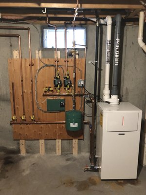 High Efficiency Bosch Greenstar Boiler Installation - Billerica, MA
Our customer's old boiler was emitting dangerously high levels of CO, so he opted to replace it with the time tested Bosch Greenstar high effiency natural gas boiler 95% AFUE. He now has lower energy bills, a safe and reliable boiler, and was able to receive a $2750 rebate through MassSave.
We were able to build most of the boiler system out of place so that our customer did not go without heat for more than a few hours during the day. High Efficiency Bosch Greenstar Boiler Installation - Billerica, MA
Our customer's old boiler was emitting dangerously high levels of CO, so he opted to replace it with the time tested Bosch Greenstar high effiency natural gas boiler 95% AFUE. He now has lower energy bills, a safe and reliable boiler, and was able to receive a $2750 rebate through MassSave.
We were able to build most of the boiler system out of place so that our customer did not go without heat for more than a few hours during the day.