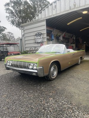 Paint Restoration: ‘64 Lincoln Continental - This 64 Lincoln continental had been garaged for most of its life, but the single stage enamel paint had severe orange peel throughout. We decided to utilize individual steps of wet sanding with 1000, 1500, 2000, and 3000 grit paper, followed by an isopropyl alcohol wipe down to remove any remaining residue. Then we did a heavy cut with the rotary buffer to remove the sanding scratches & bring back a ton of gloss to the paint, followed by 2 stage heavy cut & polish with a orbital polisher. In all, a total of 13 hours working on the paint. Customer was excited & ready to hit the road in this amazing classic car.