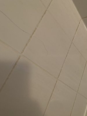 Bathroom - Before and after tile inside the shower cabin. Bathroom - Before and after tile inside the shower cabin.
