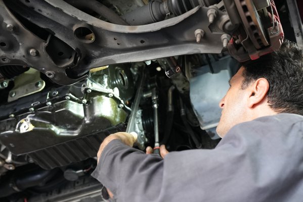 Timing Chain Restoration - At York Auto Care, we excel in addressing noisy timing chains and worn tensioners. Our expert technicians are shown in the accompanying photo carefully removing a timing chain from a VW. A faulty timing chain tensioner can lead to detrimental effects on the engine, such as improper synchronization between camshafts and crankshafts, reduced engine performance, and potential engine damage. Trust our skilled team to replace these components with precision, ensuring optimal engine function and reliability for your vehicle.