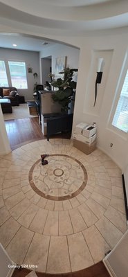 Custom Tile Entryway with Mosaic Medallion - We transformed this entryway with new tile flooring and a custom mosaic medallion. The old tile was removed and replaced with a clean, modern design, carefully installed for a beautiful and durable finish. At Lopez Brothers Tile, we focus on quality, precision, and attention to every detail. Custom Tile Entryway with Mosaic Medallion - We transformed this entryway with new tile flooring and a custom mosaic medallion. The old tile was removed and replaced with a clean, modern design, carefully installed for a beautiful and durable finish. At Lopez Brothers Tile, we focus on quality, precision, and attention to every detail.