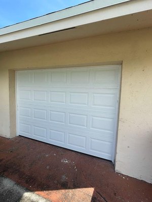 10x7 Insulated Garage Door (White) - Installing a 2000 series insulated hurricane-rated door 10 x 7 with a new opener 1/2 HP by LiftMaster 10x7 Insulated Garage Door (White) - Installing a 2000 series insulated hurricane-rated door 10 x 7 with a new opener 1/2 HP by LiftMaster