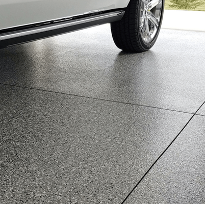 Full Chip Systems - The Full Chip, or Decorative Chip, System is our most popular concrete coating system. This three-layer system is easy to install and includes a Lifetime Residential Warranty! The first layer is a primer or base coat using our unique polyurea concrete coating. The second layer is made up of our decorate chip, which comes in a wide variety of colors. Then, a clear polyaspartic top coat is added to seal everything in for ultimate durability and a high-gloss shine. Anti-slip additives can be applied to give this textured system even more slip resistant properties. Installation is typically completed in one day and can handle vehicle traffic 24 hours later. Whether you want to protect your commercial auto shop or your residential garage, you can’t beat the protection, look, and dependability of Garage Force concrete coating. Full Chip Systems - The Full Chip, or Decorative Chip, System is our most popular concrete coating system. This three-layer system is easy to install and includes a Lifetime Residential Warranty! The first layer is a primer or base coat using our unique polyurea concrete coating. The second layer is made up of our decorate chip, which comes in a wide variety of colors. Then, a clear polyaspartic top coat is added to seal everything in for ultimate durability and a high-gloss shine. Anti-slip additives can be applied to give this textured system even more slip resistant properties. Installation is typically completed in one day and can handle vehicle traffic 24 hours later. Whether you want to protect your commercial auto shop or your residential garage, you can’t beat the protection, look, and dependability of Garage Force concrete coating.