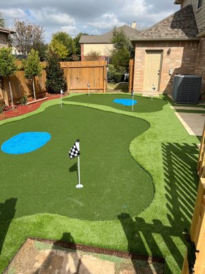 Putting Greens - Southern Turf Co. offers a wide selection of the industry’s most advanced products that mimic the look and feel of a course quality green. We install everything from elite-grade products to casual and family friendly putting surfaces that everyone can enjoy. Contact us today for a FREE ESTIMATE! Putting Greens - Southern Turf Co. offers a wide selection of the industry’s most advanced products that mimic the look and feel of a course quality green. We install everything from elite-grade products to casual and family friendly putting surfaces that everyone can enjoy. Contact us today for a FREE ESTIMATE!