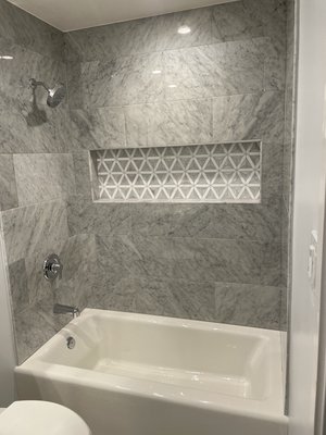 5ft by 8ft bathroom remodel. - This was a bathroom that was outdated￼ completely gutted to the studs ￼ add insulation in the walls￼ ￼￼￼￼ added Halo 6 inch can lights for proper lighting and a Ultra quiet￼ Panasonic fan￼ With heated floors.￼