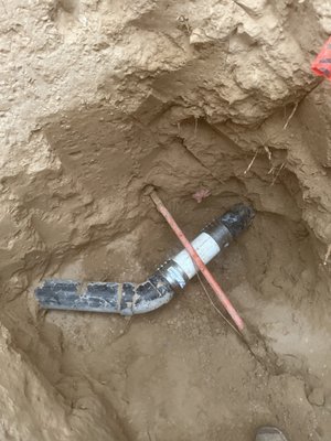 Fiber optic line obstructing sewer line - After calling us out 3 times to clear a drain blockage at their home, our customer opted to have us perform a camera inspection on their sewer line to determine the cause of the blockages. We found that a fiber optic company had drilled their line through our customer's main sewer line. We located the exact point at which this was drilled through the line using our camera and Ridgid scout locator, and excavated the spot to repair the line. After working with the fiber company to determine the best course of action, we removed the damaged section of pipe, carefully moved the fiber line out of the way, and installed a repair on the sewer line. We carefully backfilled the dirt, compacting the dirt with a plate compactor every 2 feet, and cleaned up and raked the yard back to its previous condition. Everything is now operational. Fiber optic line obstructing sewer line - After calling us out 3 times to clear a drain blockage at their home, our customer opted to have us perform a camera inspection on their sewer line to determine the cause of the blockages. We found that a fiber optic company had drilled their line through our customer's main sewer line. We located the exact point at which this was drilled through the line using our camera and Ridgid scout locator, and excavated the spot to repair the line. After working with the fiber company to determine the best course of action, we removed the damaged section of pipe, carefully moved the fiber line out of the way, and installed a repair on the sewer line. We carefully backfilled the dirt, compacting the dirt with a plate compactor every 2 feet, and cleaned up and raked the yard back to its previous condition. Everything is now operational.