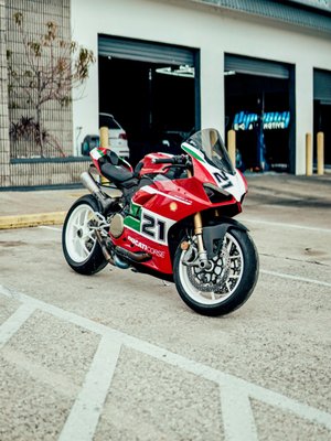 Ducati Panigale V2 Performance Exhaust Install - The Ducati Panigale V2 is already a masterpiece from the factory — but bolt on a performance exhaust and it transforms into something truly special. We installed a full performance exhaust system on this V2, unlocking a louder, more aggressive exhaust note that matches the raw character of Ducati's legendary L-twin engine while improving exhaust flow and shedding unwanted weight. The difference is immediately felt — sharper throttle response, a more linear power delivery, and a sound that turns heads every time you crack the throttle. Exhaust installs on high-performance sport bikes require careful fitment, proper heat shielding, and attention to detail — all things our technicians handle with precision every day. Dynasty Automotive is one of the few shops in Orlando that specializes in both high-performance cars AND sport bikes, giving us a level of two-wheel expertise you won't find at a typical auto shop. Ready to wake your Ducati up? Give us a call.