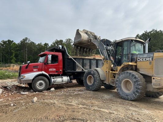 Dump Truck Rental Services - Our Dump Truck Rental Services provide the heavy-duty hauling power you need for any project. Whether transporting soil, gravel, demolition debris, or construction materials, our well-maintained fleet and professional drivers ensure efficient, on-time delivery and pickup. Flexible rental options are available to fit jobs of any size, rely on us for safe, dependable, and hassle-free material transport. Dump Truck Rental Services - Our Dump Truck Rental Services provide the heavy-duty hauling power you need for any project. Whether transporting soil, gravel, demolition debris, or construction materials, our well-maintained fleet and professional drivers ensure efficient, on-time delivery and pickup. Flexible rental options are available to fit jobs of any size, rely on us for safe, dependable, and hassle-free material transport.