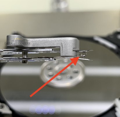 Data Recovery - Dropped Drive - Broken Head - Here is an example of a drive that was dropped and powered on for several hours. It's so important to not power on a drive after you hear any abnormal sounds.