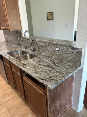 Gray Blue Dunes - Here we have another project using our Blue Dunes granite. This one has beautiful gray undertones. Granites have such a unique color and movement. If you are looking for granite, you will find what you like here! Gray Blue Dunes - Here we have another project using our Blue Dunes granite. This one has beautiful gray undertones. Granites have such a unique color and movement. If you are looking for granite, you will find what you like here!