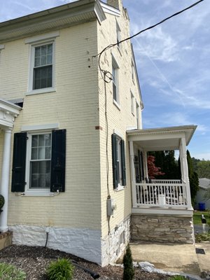 Exterior restoration of 19th century brick farm house - This project was a full scale restoration of a 3 story farm house built in 1861. A large amount of the paint and caulking had failed, therefore had to be removed and the bare surfaces resealed. The trim had been wrapped in aluminum which the homeowner opted to have painted as well. The project required use of a lift given the height and uneven terrain. Exterior restoration of 19th century brick farm house - This project was a full scale restoration of a 3 story farm house built in 1861. A large amount of the paint and caulking had failed, therefore had to be removed and the bare surfaces resealed. The trim had been wrapped in aluminum which the homeowner opted to have painted as well. The project required use of a lift given the height and uneven terrain.