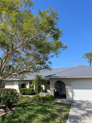 Durabull Classic Rib Roof system ( Charcoal Gray) - This roof features the Durabull Classic Rib Metal system in Charcoal Gray. A durable, cost effective solution ideal for both residential and light commercial applications. Made from high quality 29 gauge steel, it offers superior weather resistance and energy efficiency. The classic 36-inch panel width with 3/4 inch ribs provides excellent structural strength and a clean, modern aesthetic. Paired with proper underlayment and expert installation, this system ensures long lasting protection and curb appeal.
Contact us today for a free estimate! (239)347-9207