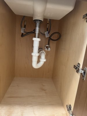 Rough and final bathroom projects - Complete bathroom plumbing installation featuring a custom shower system, dual vanity, toilet install, washer box, and tankless water heater. Clean piping, precise alignment, and quality workmanship ensure reliable performance and a modern finish.