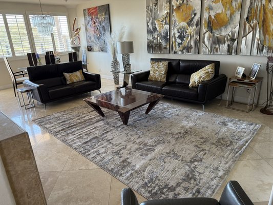 Area Rugs - People say this rug store offers a wide variety of high-quality rugs, including hand-knotted options, with a knowledgeable and helpful staff who provide excellent customer service. They also highlight the great prices and diverse selection, making it a great place to find the perfect rug.