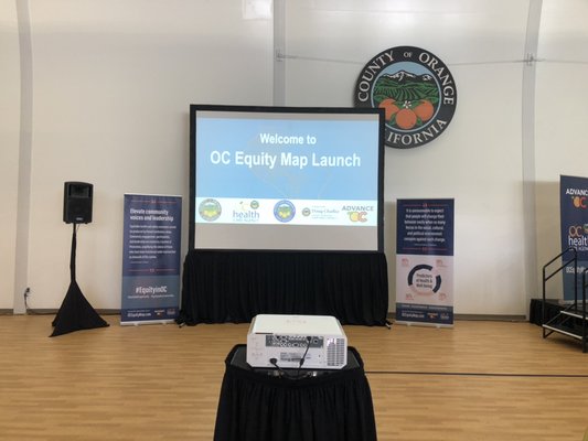 Large public conference - Two large projection screens, bright projectors, large sound system, microphones, laptop, mixing board, etc. Everything needed for a public conference for 200 people audience in a very bright room.