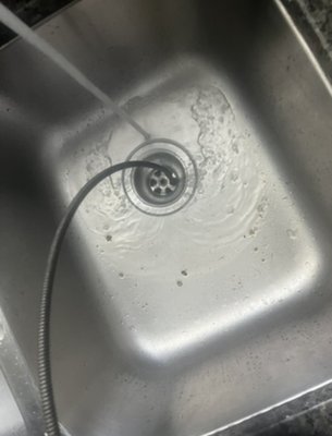 Improper Kitchen Drainage - This homeowner had an old home where the previous owner had done their own plumbing, unfortunately due to the plumbing being done improperly this sink will always have drainage issues until replaced! Leave it to the professionals!