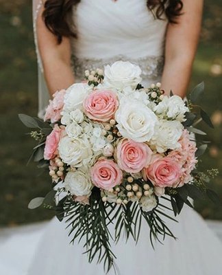 Wedding Floral Arrangements - Wedding floral arrangements play a significant role in enhancing the beauty, ambiance, and overall aesthetic of a wedding ceremony and reception. From bridal bouquets to centerpieces, floral arrangements add color, fragrance, and elegance to the event.