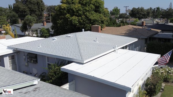 Shingle Roof Replacement in La Mirada, CA by US Best Roofing - US Best Roofing recently completed a full shingle roof replacement on a single-family home in La Mirada, CA. The original roof was showing signs of long-term wear—curling shingles, discoloration, and granule loss were visible across several sections. After a complete tear-off, our team inspected the roof deck for damage and replaced weak spots before moving forward with new installation.
The homeowners chose dimensional asphalt shingles for their durability and clean finish. We installed a underlayment for improved moisture protection, along with ridge vents to boost attic airflow. The crew worked efficiently, finishing the job without delays and leaving the site clean and safe. Shingle Roof Replacement in La Mirada, CA by US Best Roofing - US Best Roofing recently completed a full shingle roof replacement on a single-family home in La Mirada, CA. The original roof was showing signs of long-term wear—curling shingles, discoloration, and granule loss were visible across several sections. After a complete tear-off, our team inspected the roof deck for damage and replaced weak spots before moving forward with new installation.
The homeowners chose dimensional asphalt shingles for their durability and clean finish. We installed a underlayment for improved moisture protection, along with ridge vents to boost attic airflow. The crew worked efficiently, finishing the job without delays and leaving the site clean and safe.